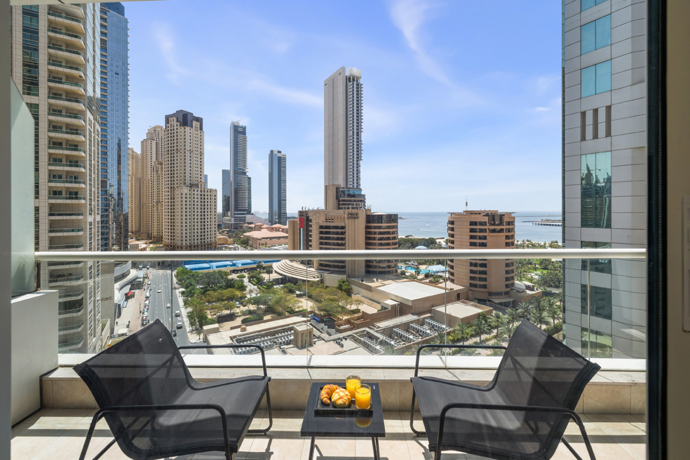 Balcony of a Homevy holiday home overlooking Dubai Marina
